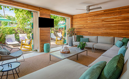 poolside private cabanas with local artist artwork